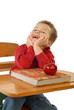 Tiny little student at a desk with textbook and apple