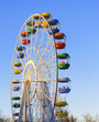 Big colorful ferris wheel over blue sky Big colorful ferris wheel over blue sky