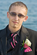 Portrait of a teenage boy in a tuxedo. 