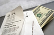 envelope full of money, coming from or going to the IRS