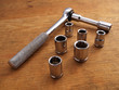 Socket wrench with 6 extra sockets