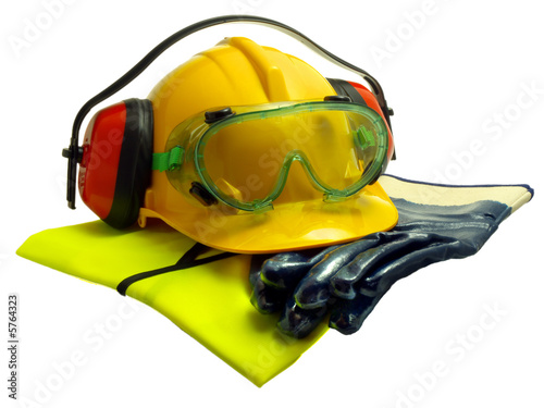 Photo: Various worker safety equipment or gear isolated on white Various worker safety equipment or gear isolated on white