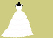 meringue style white wedding dress on mannequin
