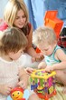 mother and children in playroom