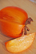 Slice of persimmon close up
