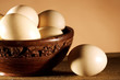 Foto: Eggs in a wooden bowl Eggs in a wooden bowl