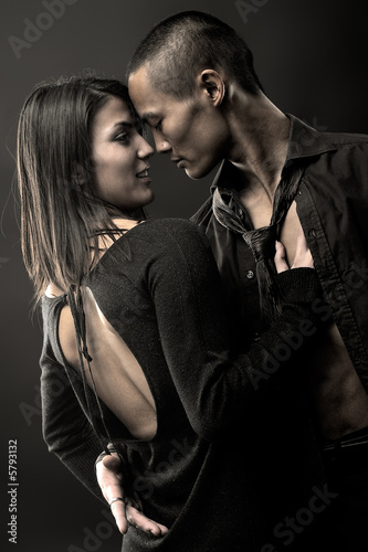 Fashion Couple Dramatic image shot in studio