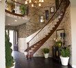 Mansion hallway with a winding staircase. Mansion hallway with a winding staircase.