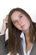 Businesswoman considers the options in a confusing decision