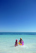 Children playing in sea