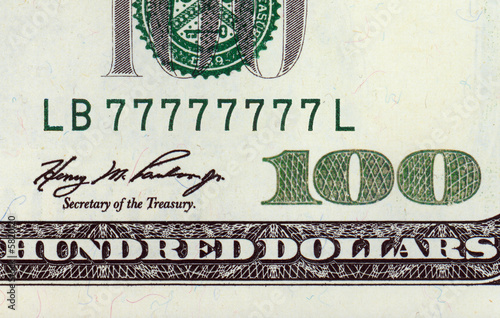 Photo: One hundred dollar bill with lucky number One hundred dollar bill with lucky number