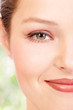 Photo: Smiling woman face. Close up. Smiling woman face. Close up.