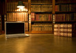 Photo: Laptop in classic library Laptop in classic library