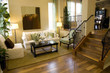 Living room and hardwood floor hallway.