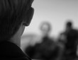 Photo: Close-up of back of the head of man giving a presentation Close-up of back of the head of man giving a presentation