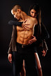 Fashion Couple Dramatic image shot in studio Fashion Couple Dramatic image shot in studio