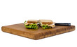 A fresh deli sandwich with lots of meat and green lettuce