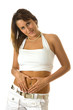 Attractive young woman showing her navel piercing