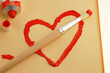 Painted red heart with brush. 