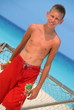 Boy playing at the beach