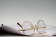 Newspaper and glasses