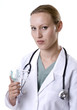 Photo: Female Ob-Gyn Doctor in the Office Female Ob-Gyn Doctor in the Office
