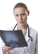 Photo: Female Doctor Reviewing an X-Ray Female Doctor Reviewing an X-Ray
