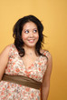 Elegantly dressed young woman with plenty of bright copy space