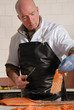 cutting smoked salmon