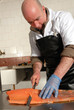 cutting smoked salmon