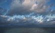 Stormy clouds and calm sea few minutes before storm.