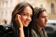 Young couple walking together in a city
