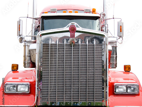 Photo: steel grill of red truck isolated on the white background steel grill of red truck isolated on the white background