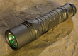 tactical flashlight with a green LED output