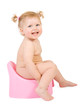 Foto: Pretty baby and pink potty . Isolate on white Pretty baby and pink potty . Isolate on white
