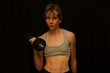 Female athlete in gym. Female athlete in gym.