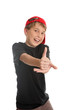 A boy giving the thumbs up hand sign, (focus to hand) 