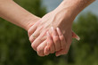 Close up of female and man's hands.