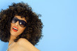 Model in a big afro wig