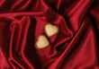 Sweet Hearts on Red Silk Background