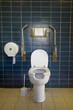 Public toilet with handicap supports Public toilet with handicap supports