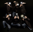 Retro style paparazzi press photographers with vintage cameras