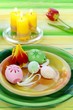 Easter table setting - eggs, tulips and candle