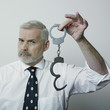 Man showing handcuffs