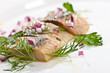 Foto: macro picture of herring fillet on the plate macro picture of herring fillet on the plate