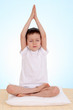 6 years old boy relaxing on blue background 6 years old boy relaxing on blue background