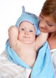 Young mother and a little baby. Over white.