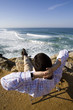 Man sit, enjoying the Ocean view