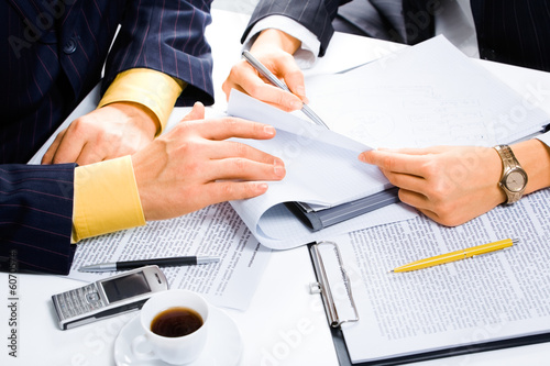 Image of people’s hands during business conversation 