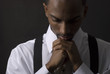 Foto: African American businessman is thinking intensely African American businessman is thinking intensely